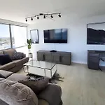 Luxury Beach-Front High-Rise Apartment